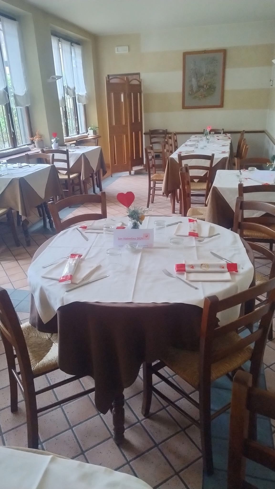La sala del Ristorante Roccolino, apparecchiata per accogliere gli ospiti